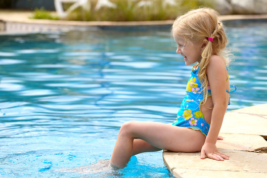 girl  near the open-air swimming pool