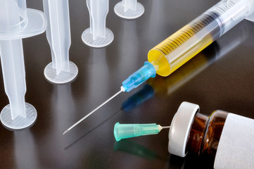 Disposable syringe and vaccine