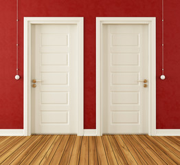 Detail of two white doors