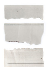 Three torn papers