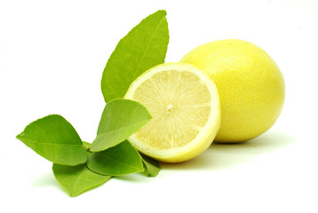 Lemon with leaves on a white background