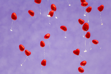 Heart ballons in the sky - symbols of love