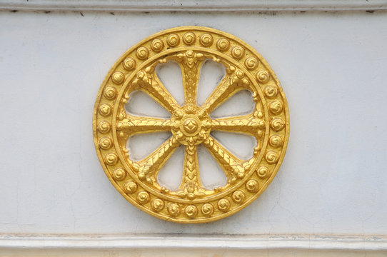 Wheel of law, Dharma on the wall.