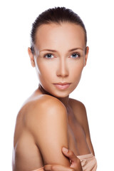 Beautiful face of young adult woman with clean fresh skin