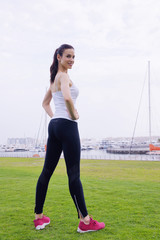 Young beautiful  woman jogging  on morning