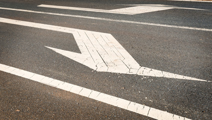 One-way signs on a road