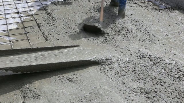 plasterer concrete worker at floor work