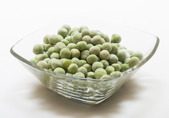 frozen peas close up in white background