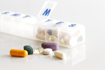 A weekly container of tablets, vitamins etc