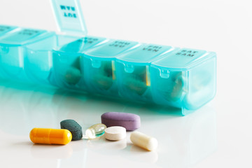 A weekly container of tablets, vitamins etc