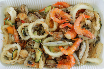 excellent fried fish with crispy fried shrimp and vegetables