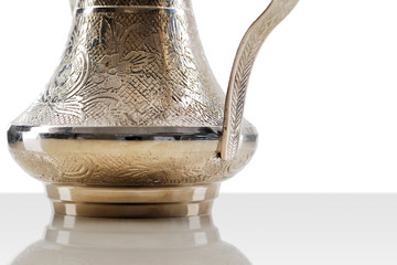 A ornate dallah, the metal pot  for making Arabic coffee
