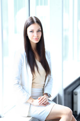 business woman in modern glass interior