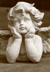 lovely angelic statue in sepia