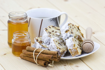 christmas stollen, honey and cinnamon sticks