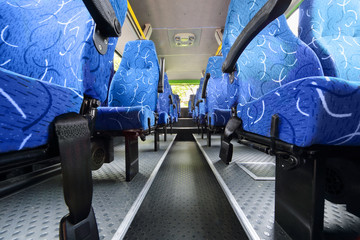 Seats in saloon of empty city bus