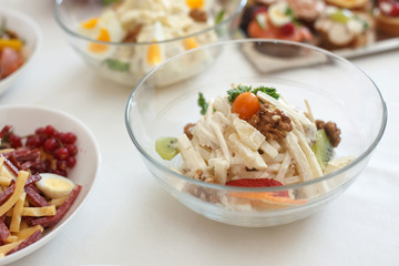 salad with celery and apple close up on white plate