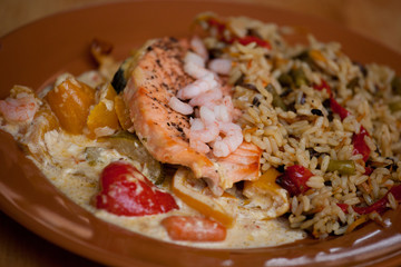 Grilled salmon with shrimps and rice