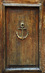 anchor on old wooden door