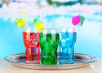 Different cocktails on bright background
