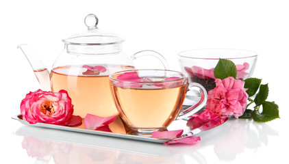 Kettle and cup of tea from tea rose
