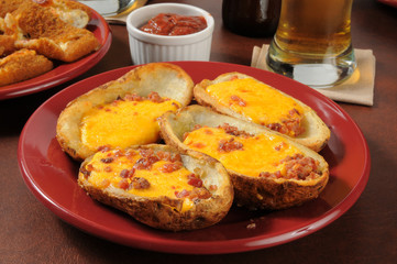 Potato skins with bacon and cheese