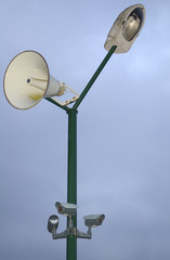 Pole with Lamp, Loudspeaker and Security Cameras