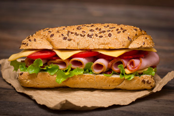Sandwich on the wooden table