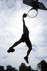 Basketball Player Slam Dunk Silhouette