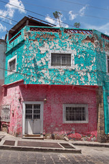 vintage mexican building with peeling paint
