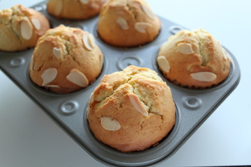 home bakery, almond muffin in mold for bakery food image