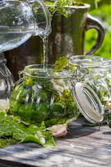 Fresh cucumbers in a jar