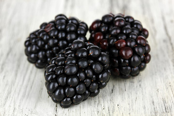 Sweet blackberries on table close-up