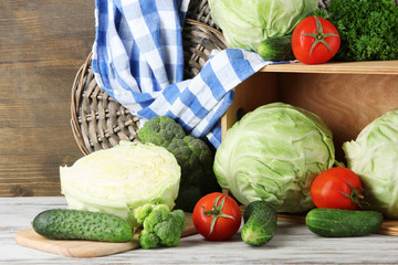 Composition of vegetables on table on wooden background