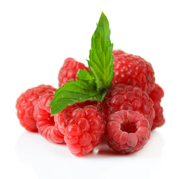 Ripe sweet raspberries isolated on white