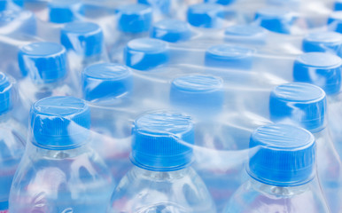 bottled water in plastic wrap