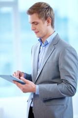 Fototapeta premium Man with touchpad