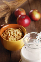 Bowl of cereals and a glass of milk
