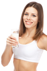 Young beautiful woman drinking milk