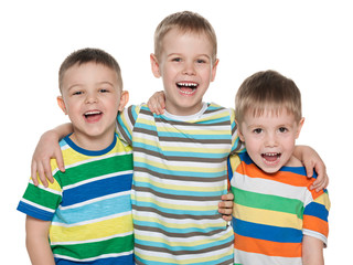 Three fashion laughing boys