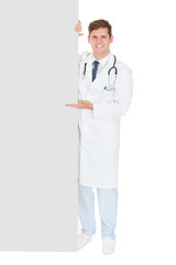 Male Doctor Holding Blank Placard