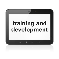 Education concept: Training and Development on tablet pc compute