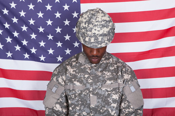 Army Soldier In Front Of American Flag