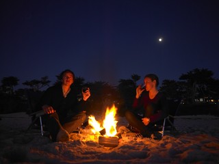 couple on the beach by night