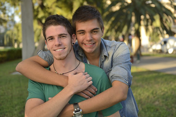 Happy gay couple outdoors