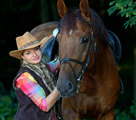 Obraz premium Girl with a horse