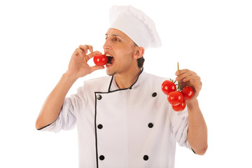 Cook eating fresh tomatoes
