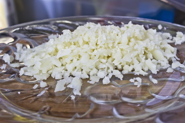 grated cheese lying on the plate
