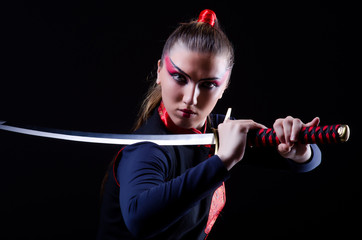 Woman in japanese martial art concept © Elnur