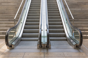 Stone stairs with elevator in modern building